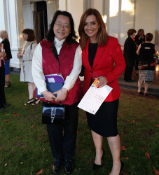 Christine Sun, manager of eBook Dynasty, with Ms Helen Kapalos, Chairperson of the Victorian Multicultural Commission, at Government House, December 3, 2015.